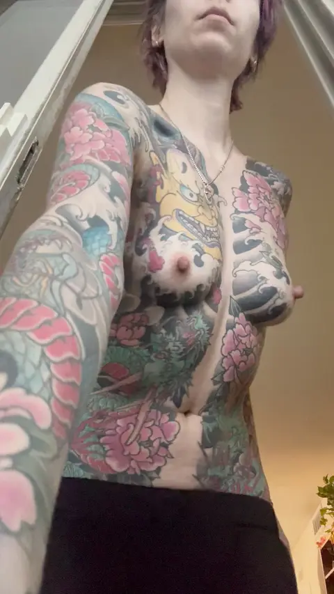 how about a fully tatted tomboy?