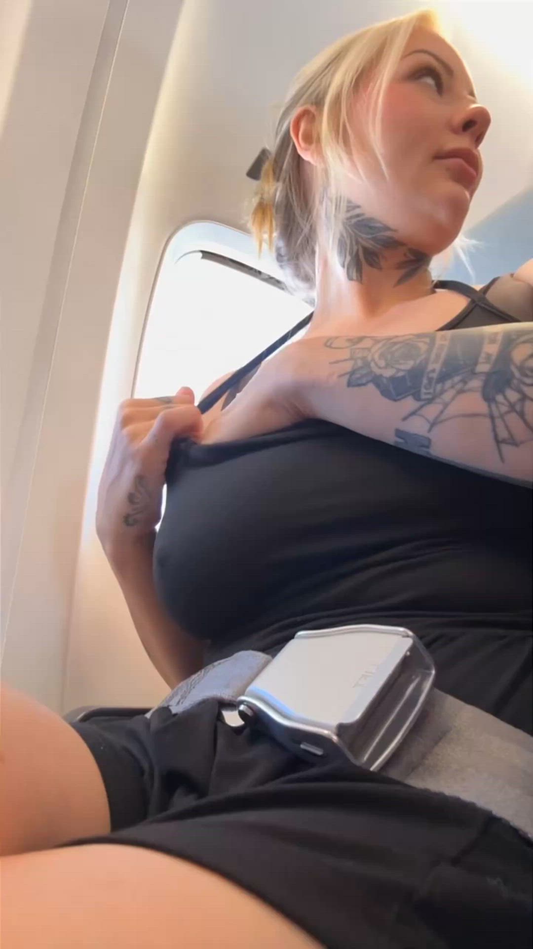 Popping a titty out on a packed flight - ignore my nervous face lol